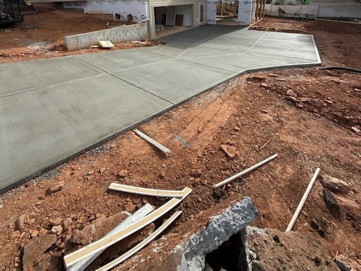 Clean finished concrete driveway — Raider Site Services